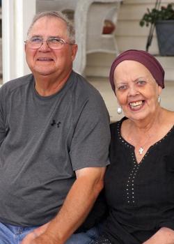 Kathleen Norris poses with her husband after undergoing successful proton therapy treatment at Medstar Georgetown University Hospital.