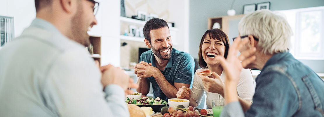 A family shares a meal together at home.