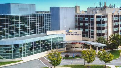 Aerial view of MedStar Good Samaritan Hospital - a modern blue-green glass and concrete building in Baltimore, Maryland.