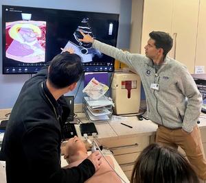 Dr Ernest Fischer teaches medical students in the Point Of Care Ultrasound track at MedStar Health.