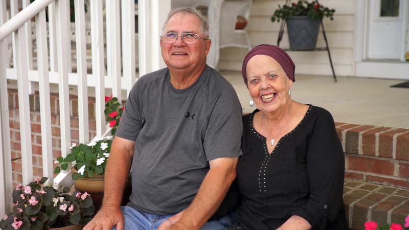 Kathleen Norris poses with her husband after undergoing successful proton therapy treatment at Medstar Georgetown University Hospital.