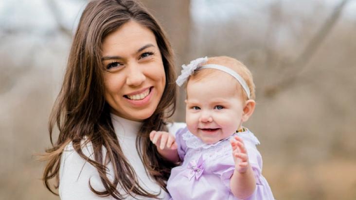 Hanna Sheenstra hold the baby whose life she saved by donating part of her liver in order to perform a life-saving transplant.