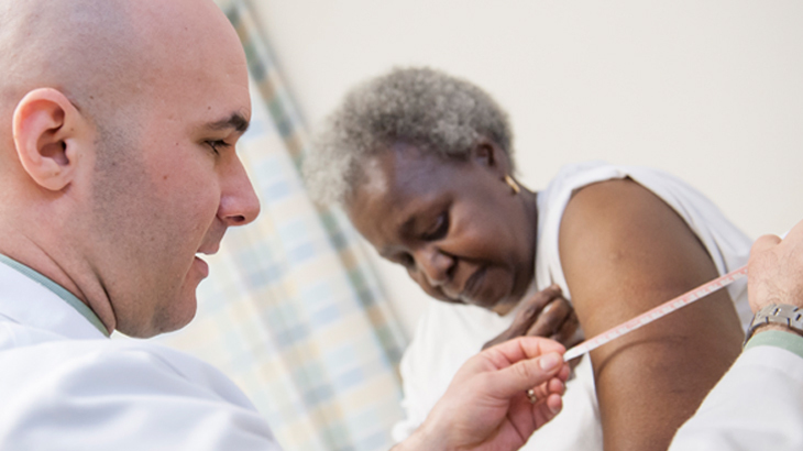 A MedStar Health physician examines a patient.