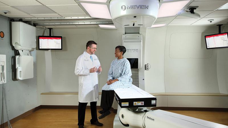 Dr. Sean Collins consults with a patient for Proton Therapy at MedStar Georgetown University Hospital.