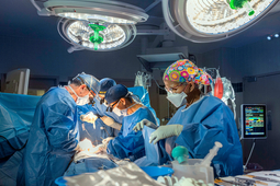 Dr Thomas MacGillivray and a team of surgeons perform a procedure in an operating room at MedStar Washington Hospital Center.