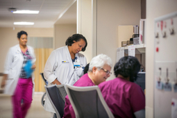 Nurses talk in a hospital hallway at MedStar Health.