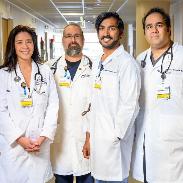 MHVI_Cardiologists standing together in a hallway_MWHC_WASHINGTON_DC_Hospitalist_Decareau_5293HiRes