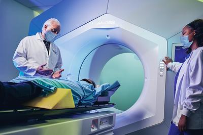 Dr Andrew Satinsky and radiation technician Cierra Parker perform a scan on a patient at MedStar Southern Maryland Hospital Center.
