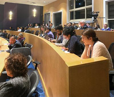 Participants listen to a presentation at the MedStar Health-Georgetown University 11th annual research education symposium.