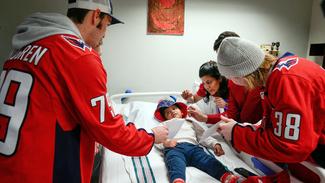 Washington Capitols players visit pediatric patients at MedStar Georgetown University Hospital on Valentine's Day.