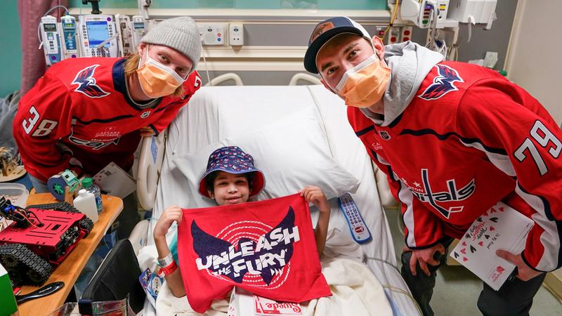 Washington Capitols players visit pediatric patients at MedStar Georgetown University Hospital on Valentine's Day.