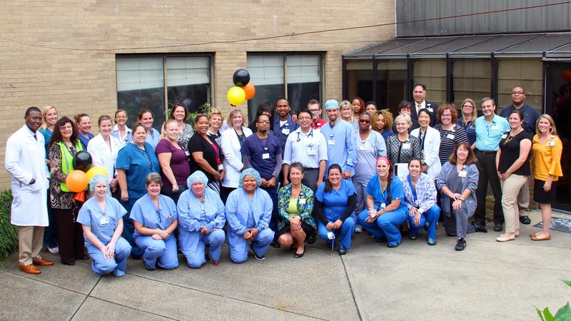 Group photo from the final event in MedStar Southern Maryland Hospital Center's Atrium Room, before rennovations.