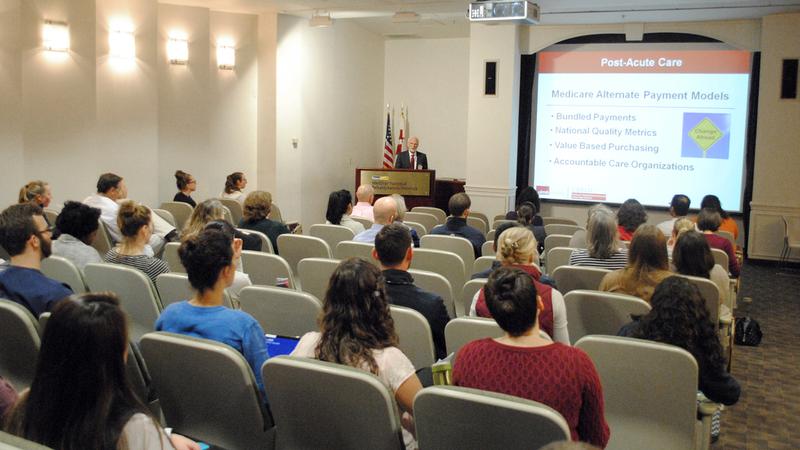 Dr Kenneth Ottenbacher speaks to an audience at MedStar National Rehabilitation Hospital.