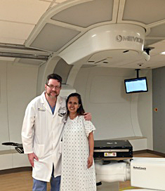 Dr Sean Collins with a patient