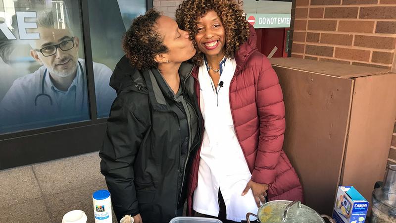 Dr Theresa Stone works at a community healthy eating event in Washington DC.