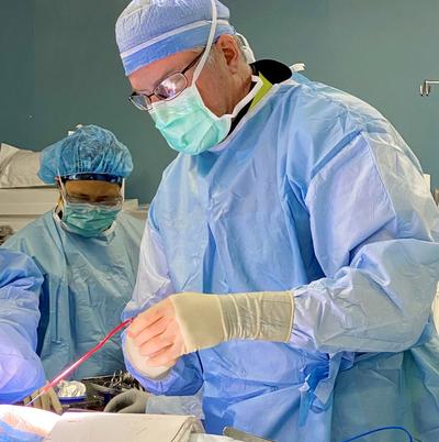 Dr. Brian Bethea performs a surgical procedure in the cardiac catheterization lab at MedStar Health.