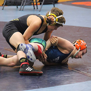 Kids from the Olney Boys and Girls Club participate in wrestling.