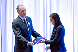 Natalie Shammas recieving her plaque