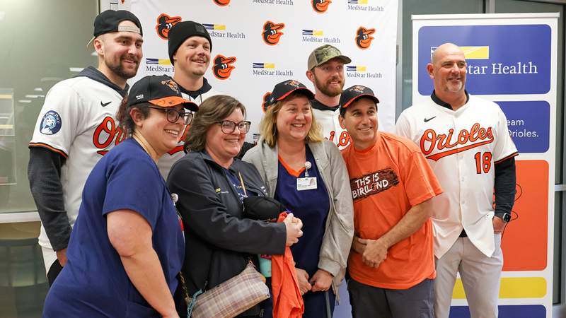 Baltimore Orioles players visit MedStar Health hospitals as part of the Birdland Caravan program.