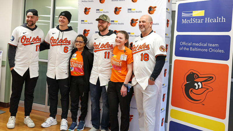 Baltimore Orioles players visit MedStar Health hospitals as part of the Birdland Caravan program.