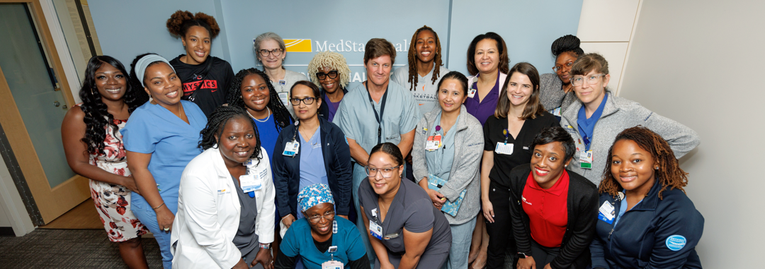 The medical team for the Washington Mystics WNBA team poses for a photo.