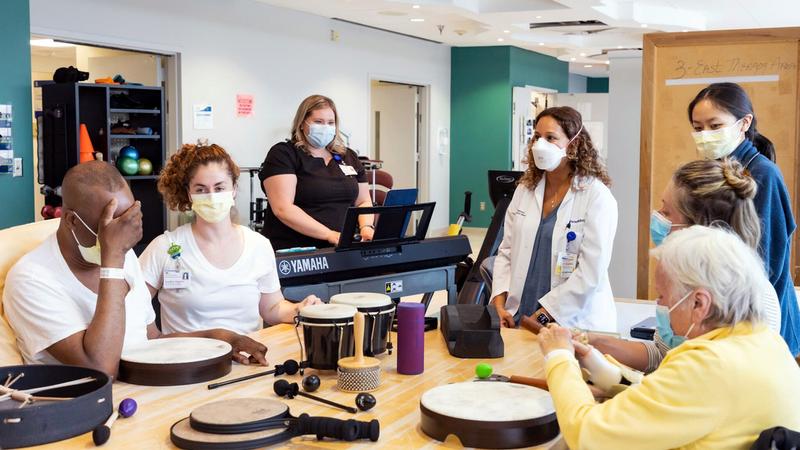 A group of patients participates in a music therapy class at MedStar Health.