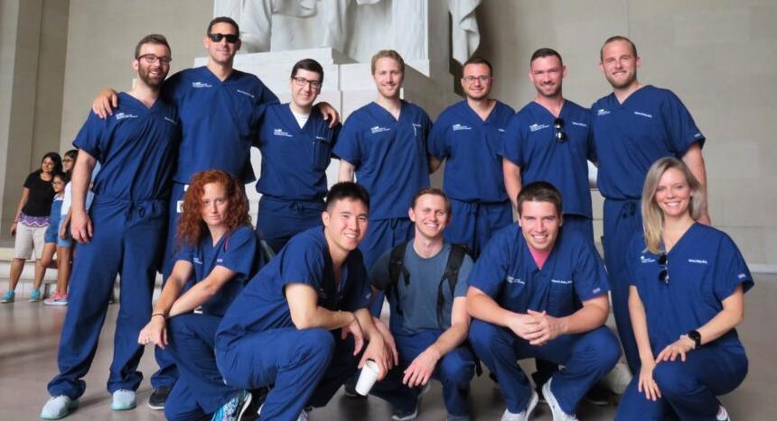 A group of residents from the MedStar Health Physical Medicine and Rehabiltation Residency Program pose for a photo inside the Lincoln Memorial in Washington DC.
