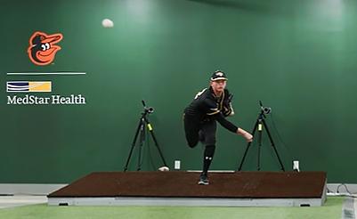 A pitcher for the Baltimore Orioles throws a pitch at the MedStar Health pitching lab in Bel Air, Maryland.