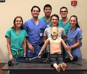 Group photo of students and faculty in MedStar Health's Otolaryngology Head and Neck Surgery Residency program.