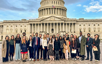 Residents from the MedStar Health Internal Medicine Residency Program pose for a photo in front of the US Capitol building.