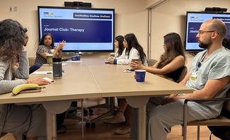 Internal Medicine Residency program participants in a meeting.