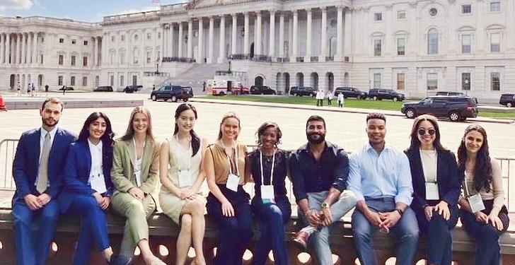 Residents from MedStar Health's Ophthalmology Residency Program pose for a fun photo outdoors.