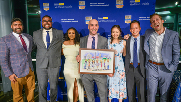 Graduates from the Physical Medicine and Rehabilitation Residency Progam at MedStar Health, pose for a photo.