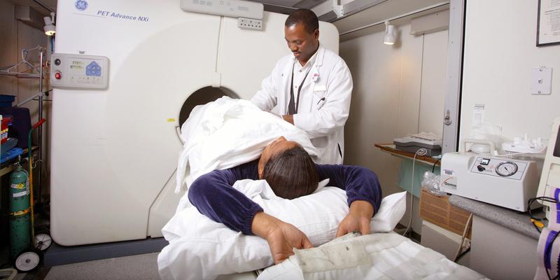 A MedStar Health radiology technician prepares a patient for a scan.