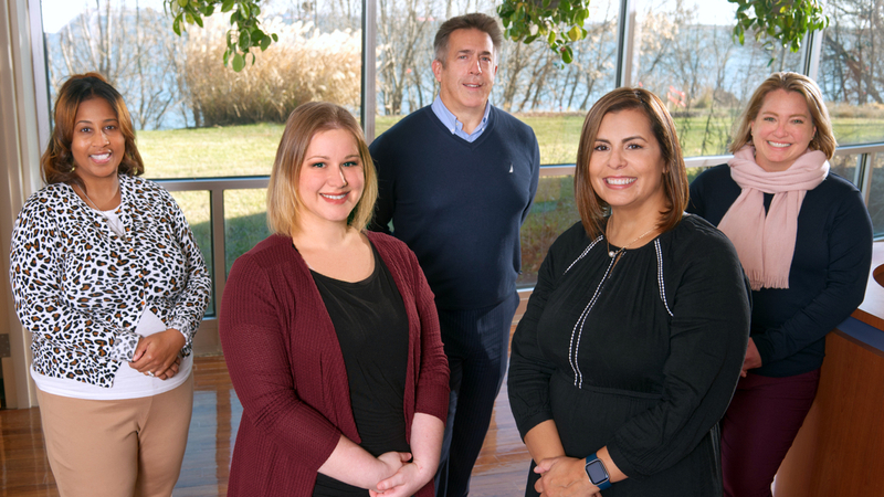 Jamie Holmes, health educator; Angela Davis, RN, case manager; Michael Sickler, program manager; and outreach representatives Yugaris Carrasquel and Fatima Engelman.