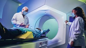 Dr Andrew Satinsky and radiation technician Cierra Parker perform a scan on a patient at MedStar Southern Maryland Hospital Center.