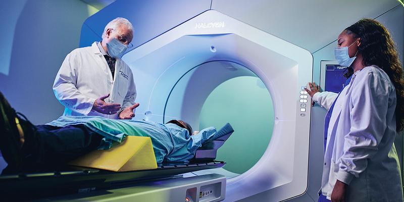 Dr Andrew Satinsky and radiation technician Cierra Parker perform a scan on a patient at MedStar Southern Maryland Hospital Center.