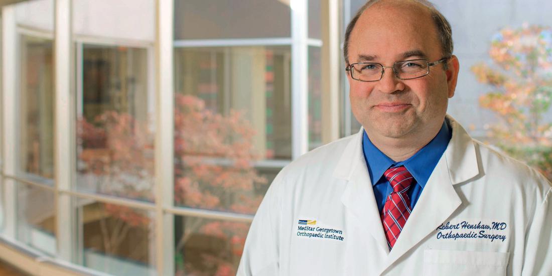 Dr. Robert Henshaw poses for a photo in the lobby at MedStar Washington Hospital Center.